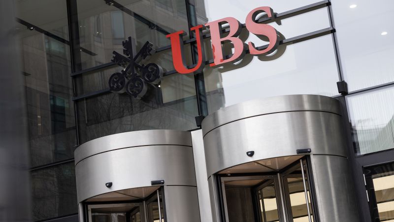 NextImg:UBS shares rattled by report of US probe into Russia sanctions evasion | CNN Business