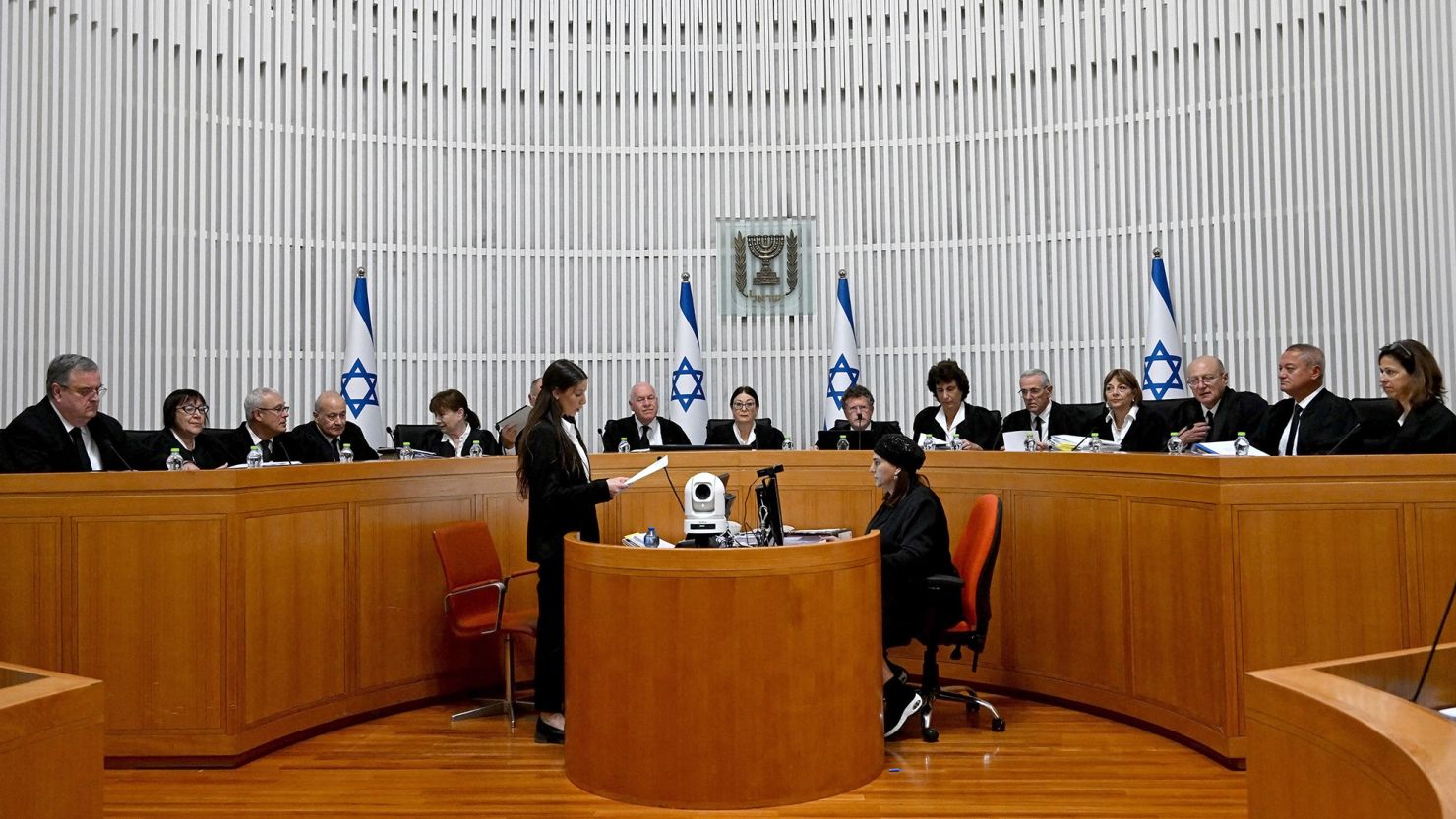 President of the Israeli Supreme Court Esther Hayut and all fifteen judges assemble to hear petitions against the 'reasonableness clause' at the court premises in Jerusalem, on September 12, 2023. The petitions call to strike down the clause passed by Israel's hardline government through parliament in July, a major element of a controversial judicial overhaul that has triggered mass protests and divided the nation. The amendment limits the powers of the top court to review and sometimes overturn government decisions, which opponents say paves the way to authoritarianism. (Photo by DEBBIE HILL / POOL / AFP) (Photo by DEBBIE HILL/POOL/AFP via Getty Images)