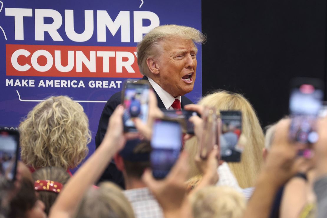 GRIMES, IOWA - JUNE 01: Former President Donald Trump greets supporters at a Team Trump volunteer leadership training event held at the Grimes Community Complex on June 01, 2023 in Grimes, Iowa. Trump delivered an unscripted speech to the crowd at the event before taking several questions from his supporters.  (Photo by Scott Olson/Getty Images)