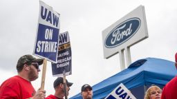 Members of the United Auto Workers (UAW) pickett outside of the Michigan Parts Assembly Plant in Wayne, Michigan amid rumors that US President Joe Biden may stop by during his visit to Michigan to stand on the pickett lines with UAW workers in Detroit, Michigan on September 26, 2023. Biden traveled to Michigan to lend his support to the striking UAW workers a day before former president Donald Trump was scheduled to visit and hold a rally for UAW workers. (Photo by Matthew Hatcher / AFP) (Photo by MATTHEW HATCHER/AFP via Getty Images)