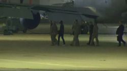 A still from a video shows an individual who appears to be Travis King, third from right, deplaning after landing at Kelly Field near San Antonio early Thursday, September 28, 2023. King, an American serviceman, was returned to US custody from North Korea.