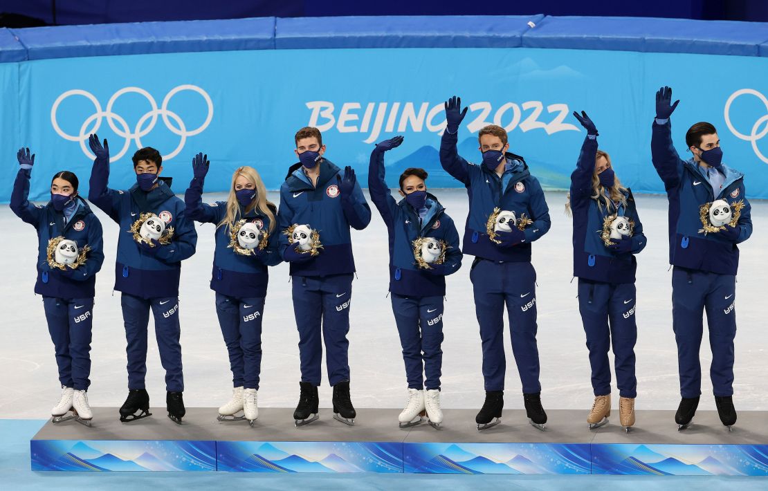 BEIJING, CHINA - FEBRUARY 07: Silver medalists Team United States celebrate during the Team Event flower ceremony on day three of the Beijing 2022 Winter Olympic Games at Capital Indoor Stadium on February 07, 2022 in Beijing, China. (Photo by Jean Catuffe/Getty Images)