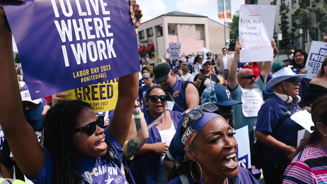 Thousands of healthcare workers march down W Sunset Blvd. to call for improved working conditions, better support systems and increased investment in the healthcare workforce at Kaiser Permanente Los Angeles Medical Center in Hollywood on Monday, Sept. 4, 2023 in Los Angeles, CA.