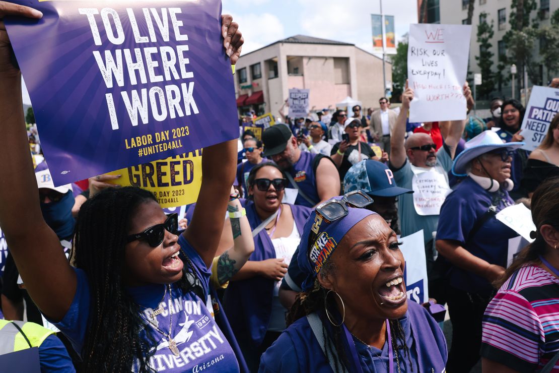 Thousands of healthcare workers march down W Sunset Blvd. to call for improved working conditions, better support systems and increased investment in the healthcare workforce at Kaiser Permanente Los Angeles Medical Center in Hollywood on Monday, Sept. 4, 2023 in Los Angeles, CA.