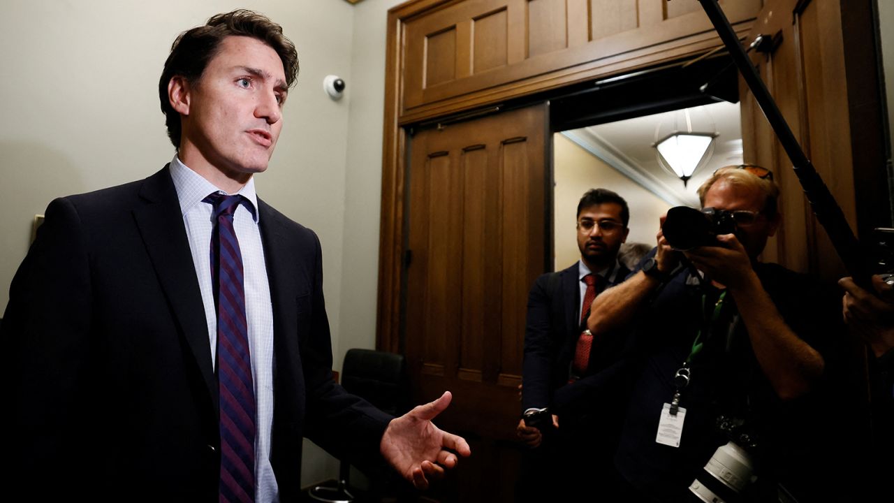 Canadian Prime Minister Justin Trudeau speaks to media outside his office in Ottawa on September 25, 2023. 