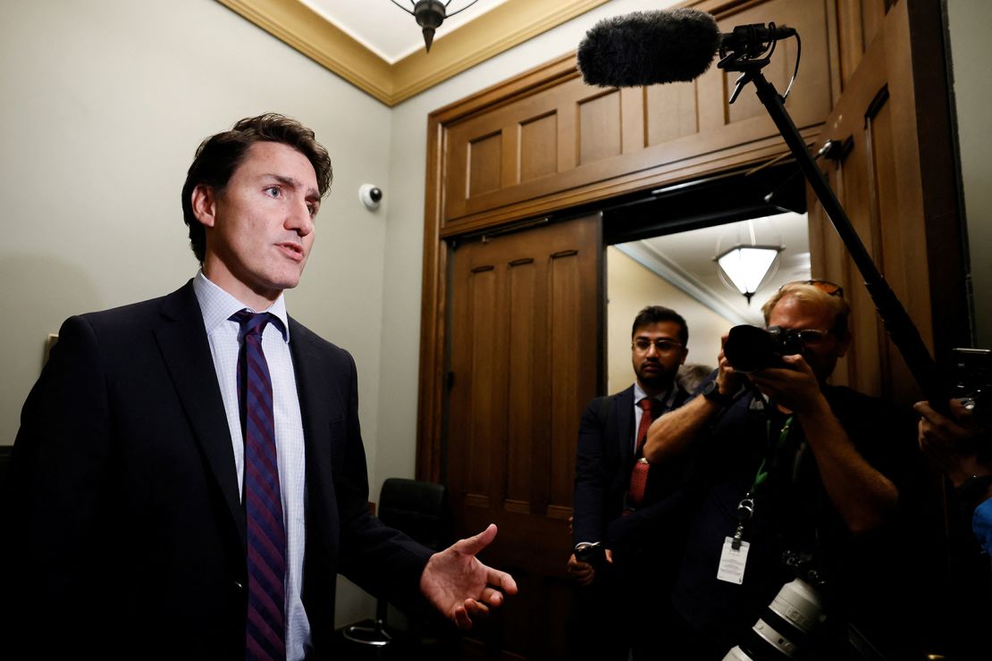 Canadian Prime Minister Justin Trudeau speaks to media outside his office in Ottawa on September 25, 2023. 