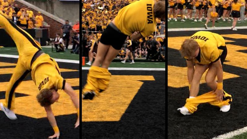 Cheerleader flips out of his pants in front of 70 000 football fans