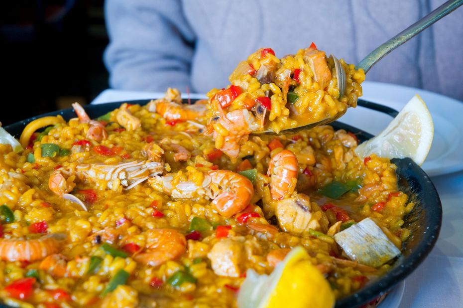 <strong>Paella:</strong> Originating in the region around Valencia, paella traditionally comes in two varieties: paella Valenciana (with rabbit and chicken) and seafood paella. 