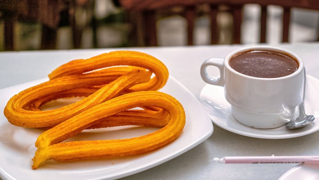 <strong>Churros: </strong>Few places make deep-fried dough as finger-licking good as Spain. Often doused in sugar and dipped in hot melted chocolate, churros are a favorite during street festivals.