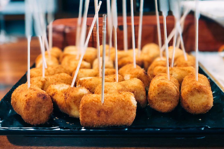 <strong>Croquetas</strong>: These are tubes of bechamel sauce encased in fried breadcrumbs. Jamón  and salt cod are popular fillings.
