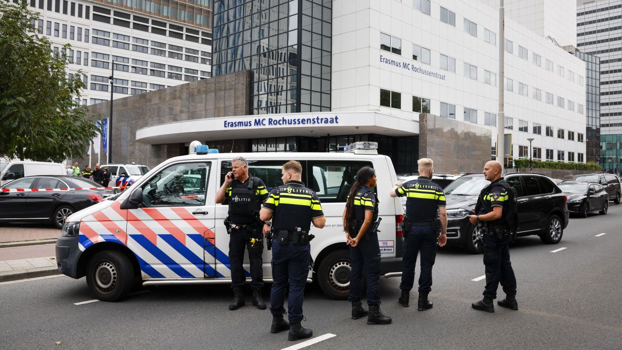 Netherlands' police officers gather near the entrance to Erasmus University Medical Center (Erasmus MC) in Rotterdam on September 28, 2023.
