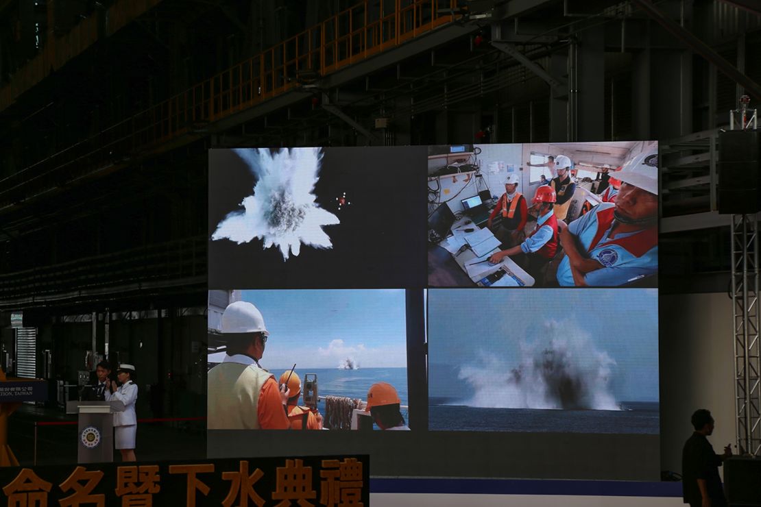 A video showing the submarine's construction and testing is shown during the launch ceremony in Kaohsiung on September 28.