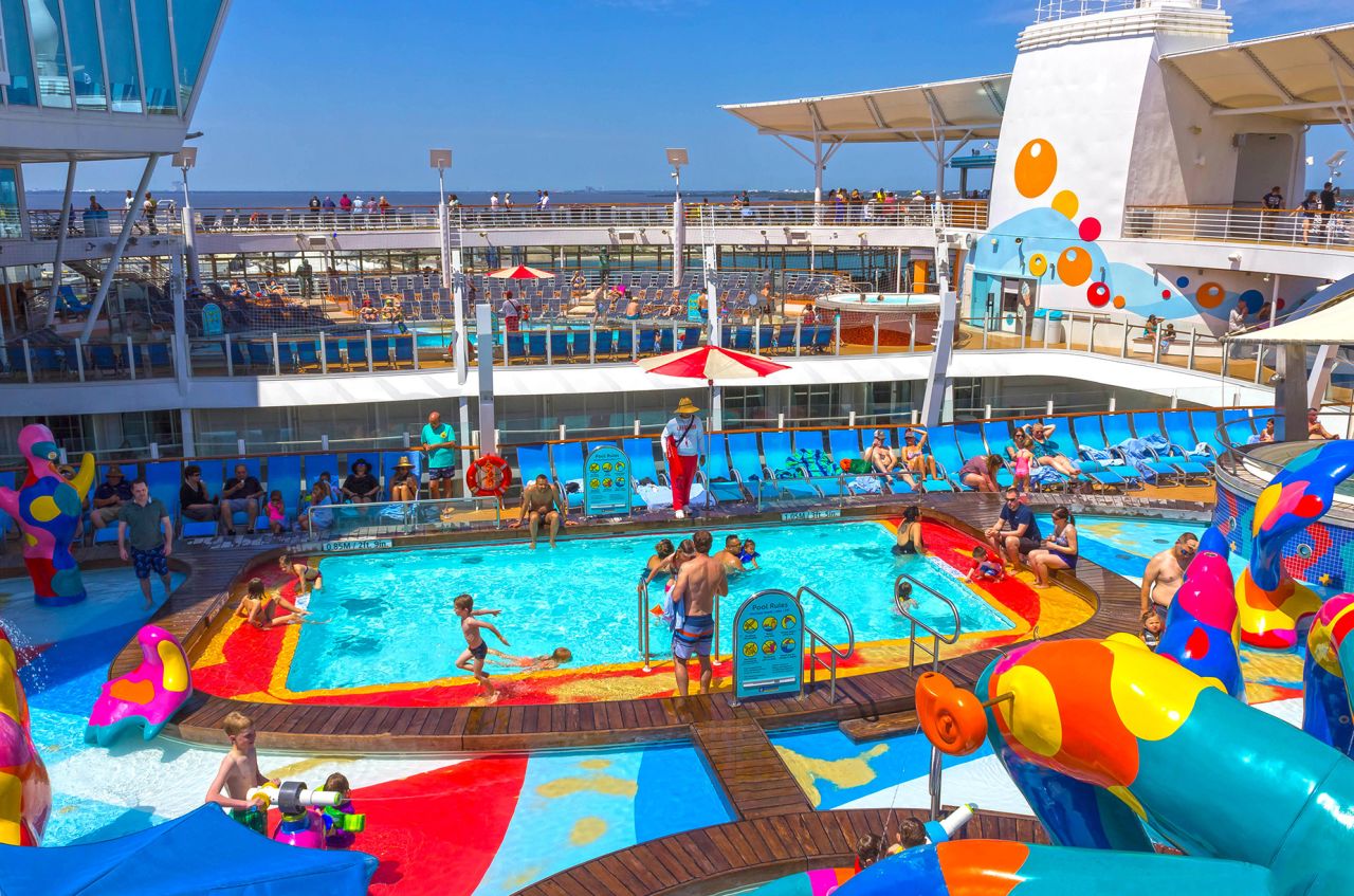 MRDAH1 Cape Canaveral, USA - April 29, 2018: The upper deck with swimming pools at cruise liner or ship Oasis of the Seas by Royal Caribbean