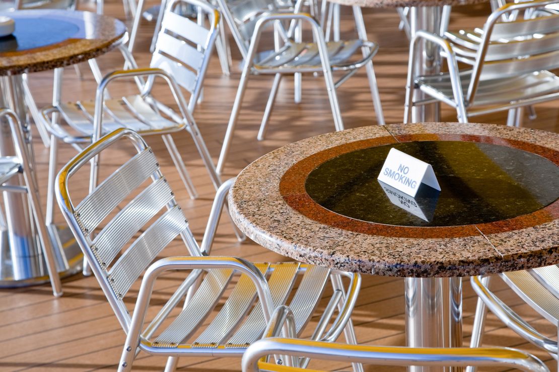 no smoking area in outdoor cafe on stern of cruise liner