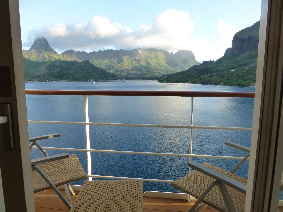 A view of Opunohu Bay and surrounding landscape in Moorea, French Polynesia, from a cruise ship balcony.