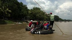 Migrants from Venezuela on an improvised raft cross the Suchiate river between Guatemala and Mexico in Southern Mexico on 27 September 2023. (Photo: David von Blohn/CNN)