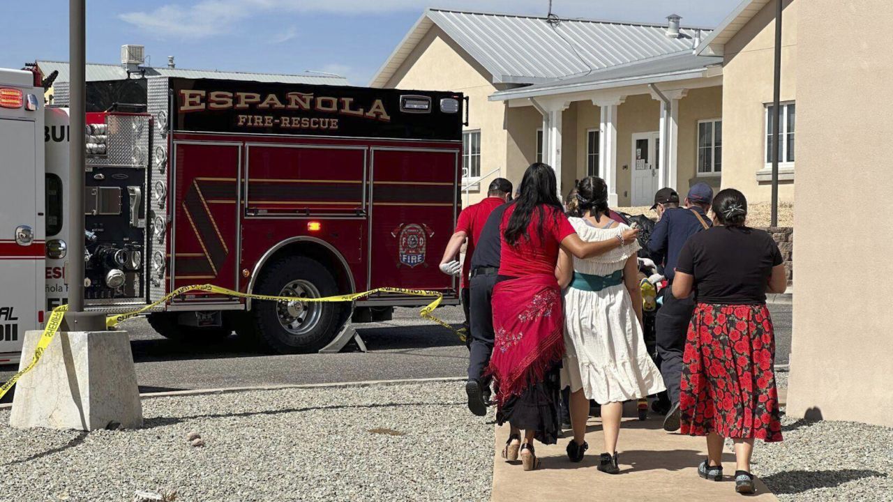 First responders arrived at the scene of a shooting Thursday, in Española, New Mexico, where a protest over a statue of Spanish conquistador Juan de Oñate turned violent.