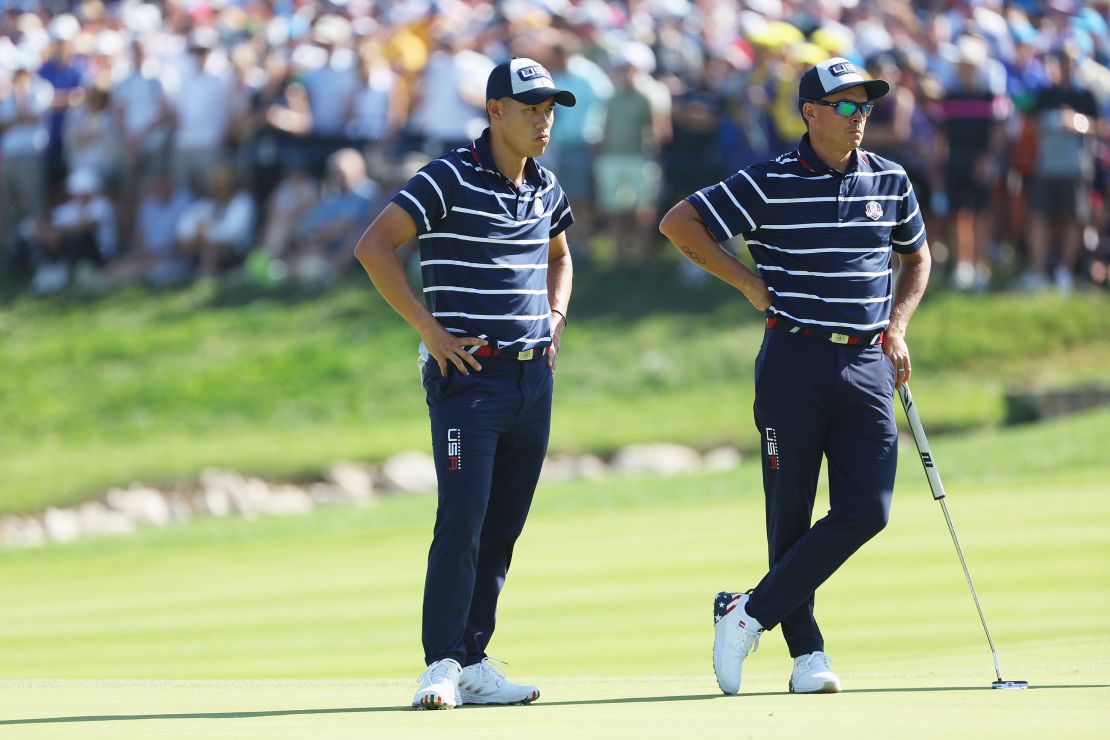 Collin Morikawa and Rickie Fowler of Team United States react on the 16th green during the Friday morning foursomes matches of the 2023 Ryder Cup at Marco Simone Golf Club on September 29, 2023 in Rome, Italy.