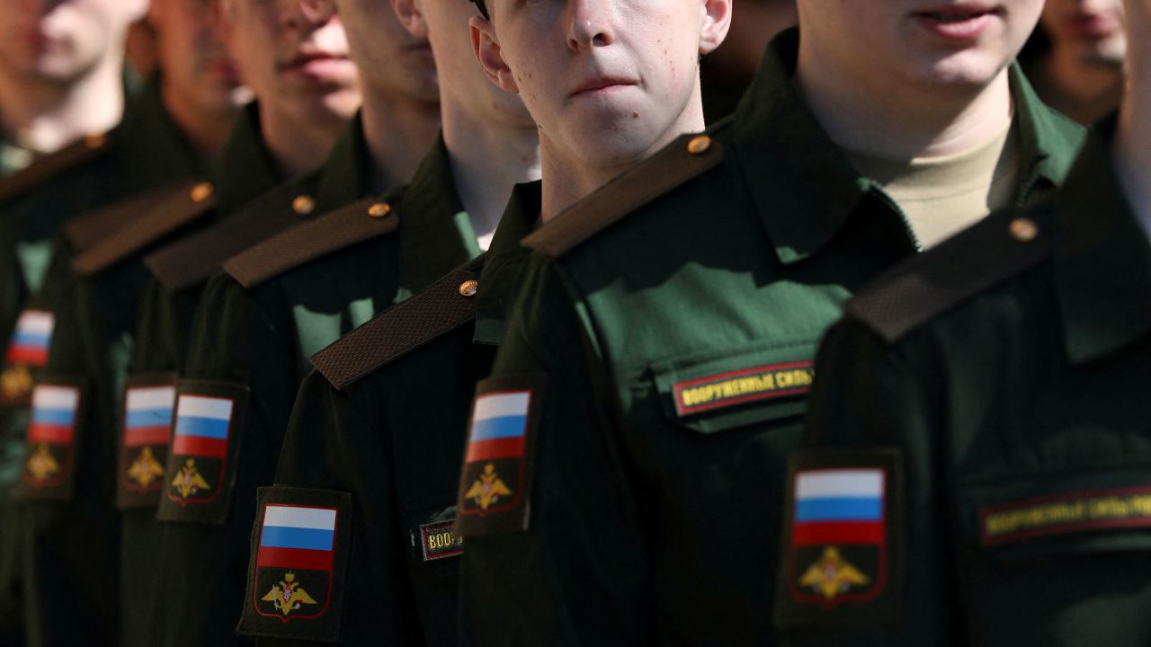 Russian conscripts line up before their departure for garrisons at a recruitment center in Simferopol, Crimea, on April 25, 2023.