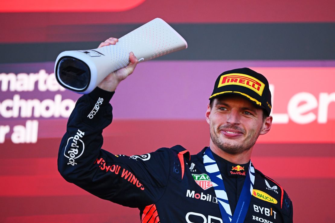 SUZUKA, JAPAN - SEPTEMBER 24: Race winner Max Verstappen of the Netherlands and Oracle Red Bull Racing celebrates on the podium during the F1 Grand Prix of Japan at Suzuka International Racing Course on September 24, 2023 in Suzuka, Japan. (Photo by Clive Mason/Getty Images)