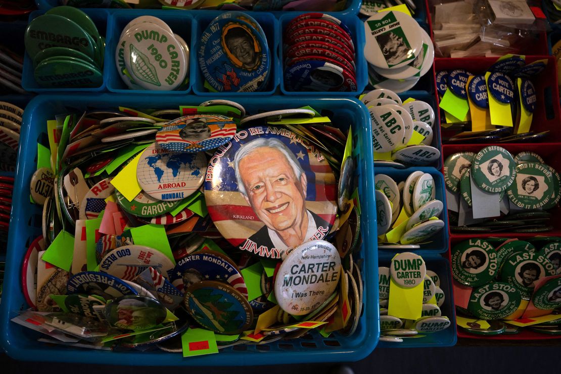 Campaign buttons for former President Jimmy Carter and others are seen in February in Plains.