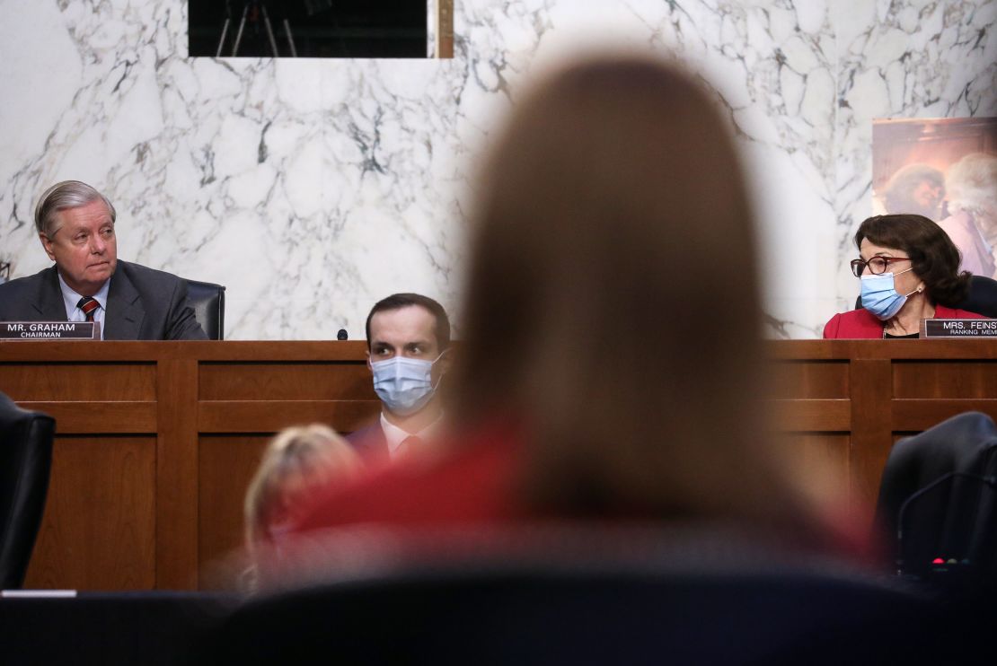 Senate Judiciary Committee Chairman Lindsey Graham looks in the direction of Feinstein during the second day of Supreme Court confirmation hearings for Judge Amy Coney Barrett on October 13, 2020.