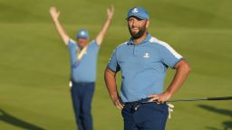 Europe's Jon Rahm reacts on the 18th green after his birdie putt gives Europe a tie in their afternoon Fourballs match at the Ryder Cup golf tournament at the Marco Simone Golf Club in Guidonia Montecelio, Italy, Friday, Sept. 29, 2023. (AP Photo/Gregorio Borgia )