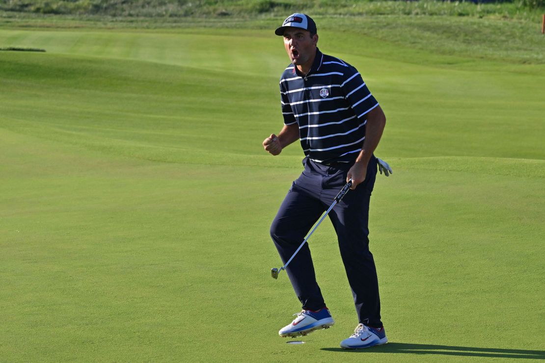 US golfer, Scottie Scheffler reacts after making a birdie to win the hole on the 17th green during his four-ball match on the first day of play in the 44th Ryder Cup at the Marco Simone Golf and Country Club in Rome on September 29, 2023. (Photo by Andreas SOLARO / AFP) (Photo by ANDREAS SOLARO/AFP via Getty Images)