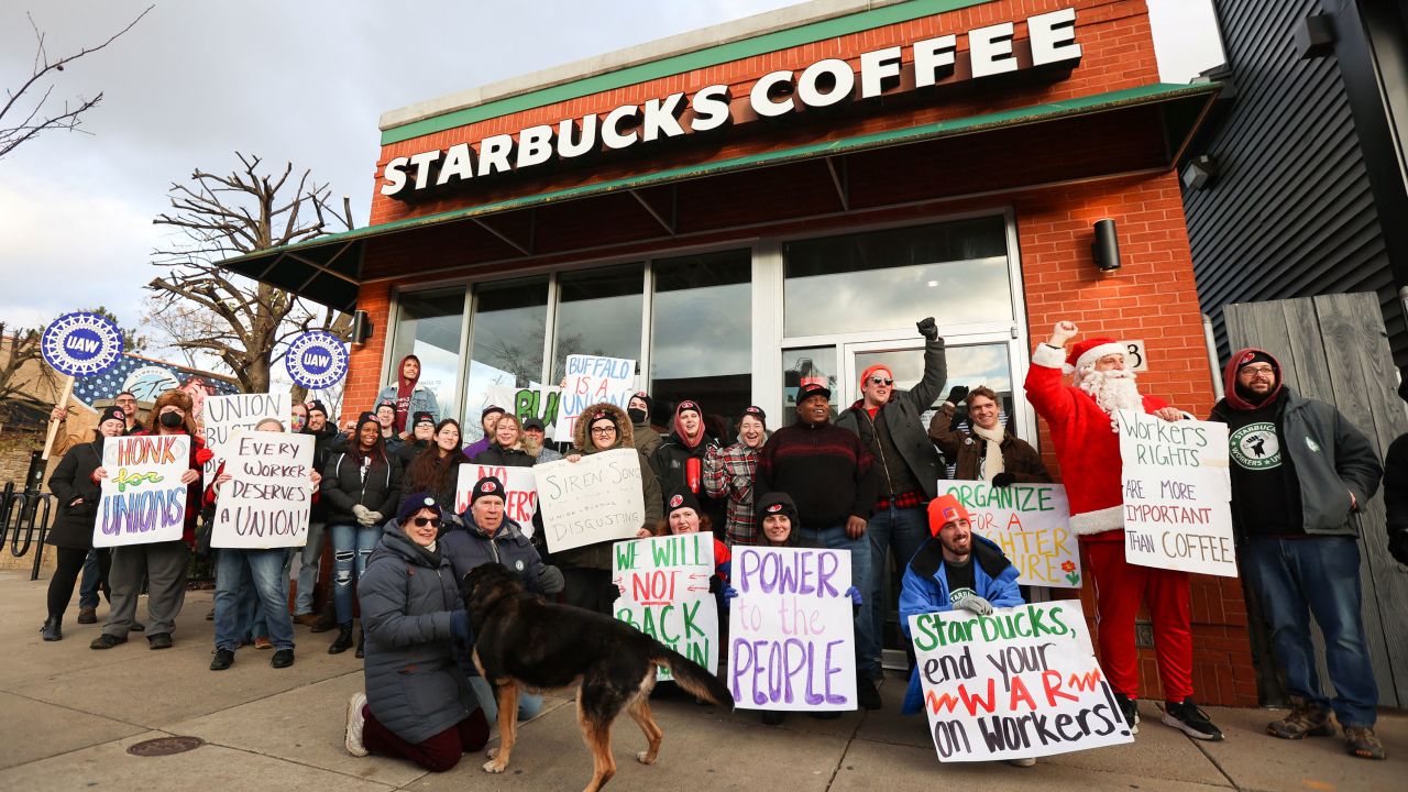 Starbucks workers rally outtside of a store in Buffalo, New York, in 2022.