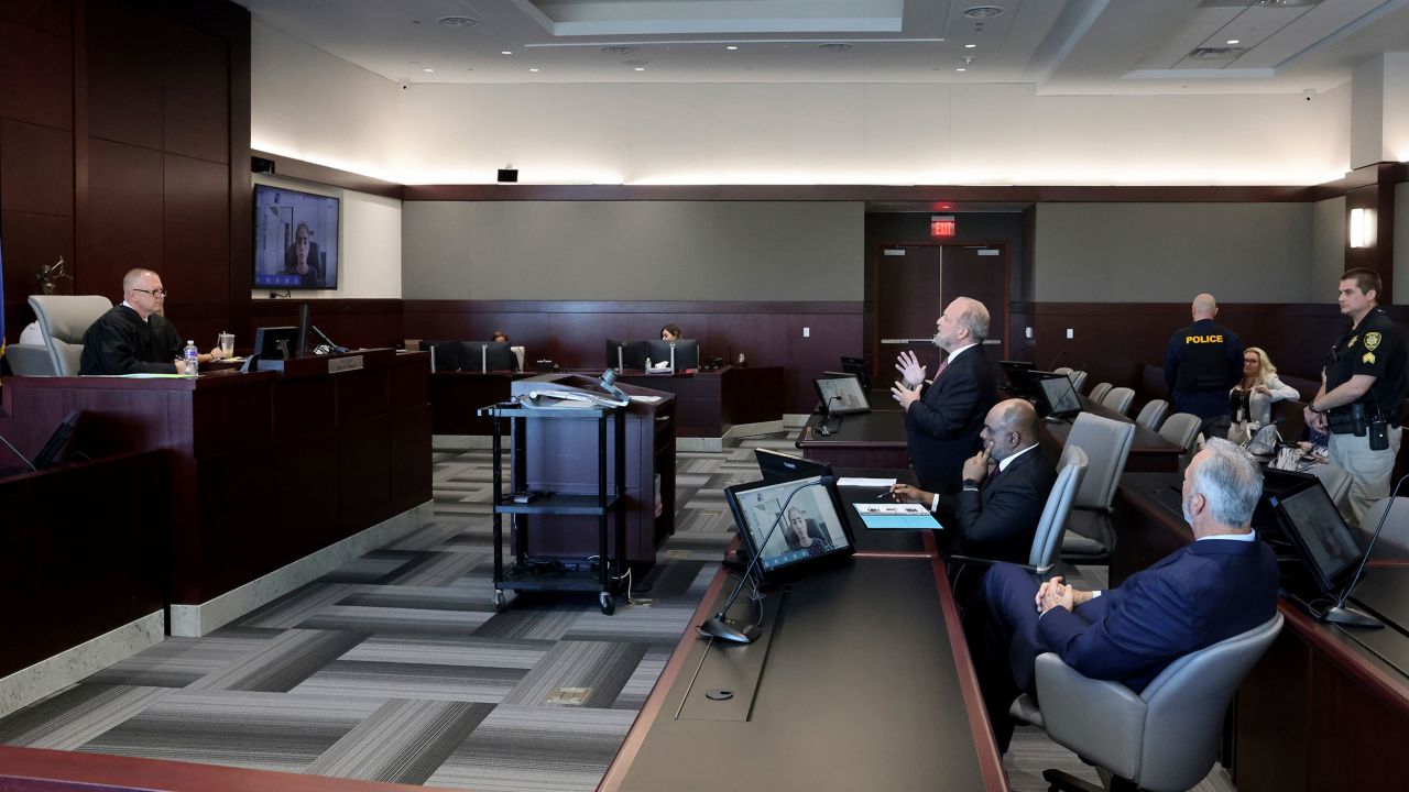 Clark County Chief Deputy Marc DiGiacomo, standing center, tells Chief Judge Jerry Wiese a grand jury indictment in the 1996 murder of rapper Tupac Shakur during a court hearing in Las Vegas.