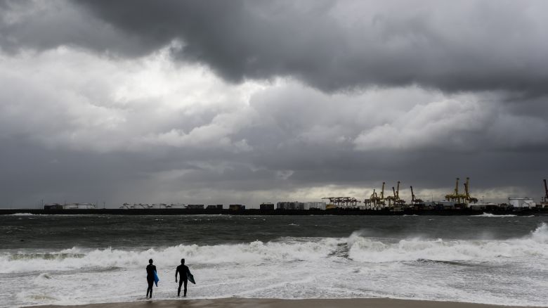 SYDNEY, AUSTRALIA - JUNE 04: Two young bodyboarders contemplate paddling out as huge waves break inside Botany Bay on June 04, 2019 in Sydney, Australia. The Bureau of Meteorology issued a severe weather warning on Monday for coastline from Victoria to Kempsey on the NSW Mid North Coast, with damaging winds and heavy surf forecast. (Photo by Brook Mitchell/Getty Images)