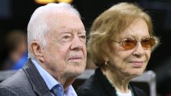 Former President Jimmy Carter and first lady Rosalynn Carter attend an NFL game between the Altanta Falcons and Cincinnati Bengals on Sept 30, 2018, in Atlanta.