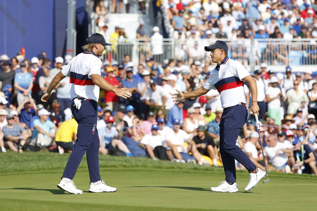 ROME, ITALY - SEPTEMBER 30: Sam Burns and Collin Morikawa of Team United States celebrate on the 12th green during the Saturday afternoon fourball matches of the 2023 Ryder Cup at Marco Simone Golf Club on September 30, 2023 in Rome, Italy. (Photo by Mike Ehrmann/Getty Images)