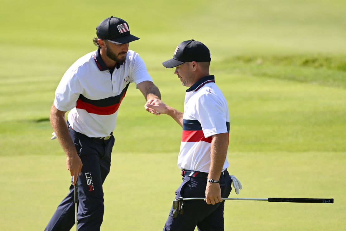 ROME, ITALY - SEPTEMBER 30: Max Homa and Brian Harman of Team United States fist bump on the ninth green during the Saturday afternoon fourball matches of the 2023 Ryder Cup at Marco Simone Golf Club on September 30, 2023 in Rome, Italy. (Photo by Ross Kinnaird/Getty Images)