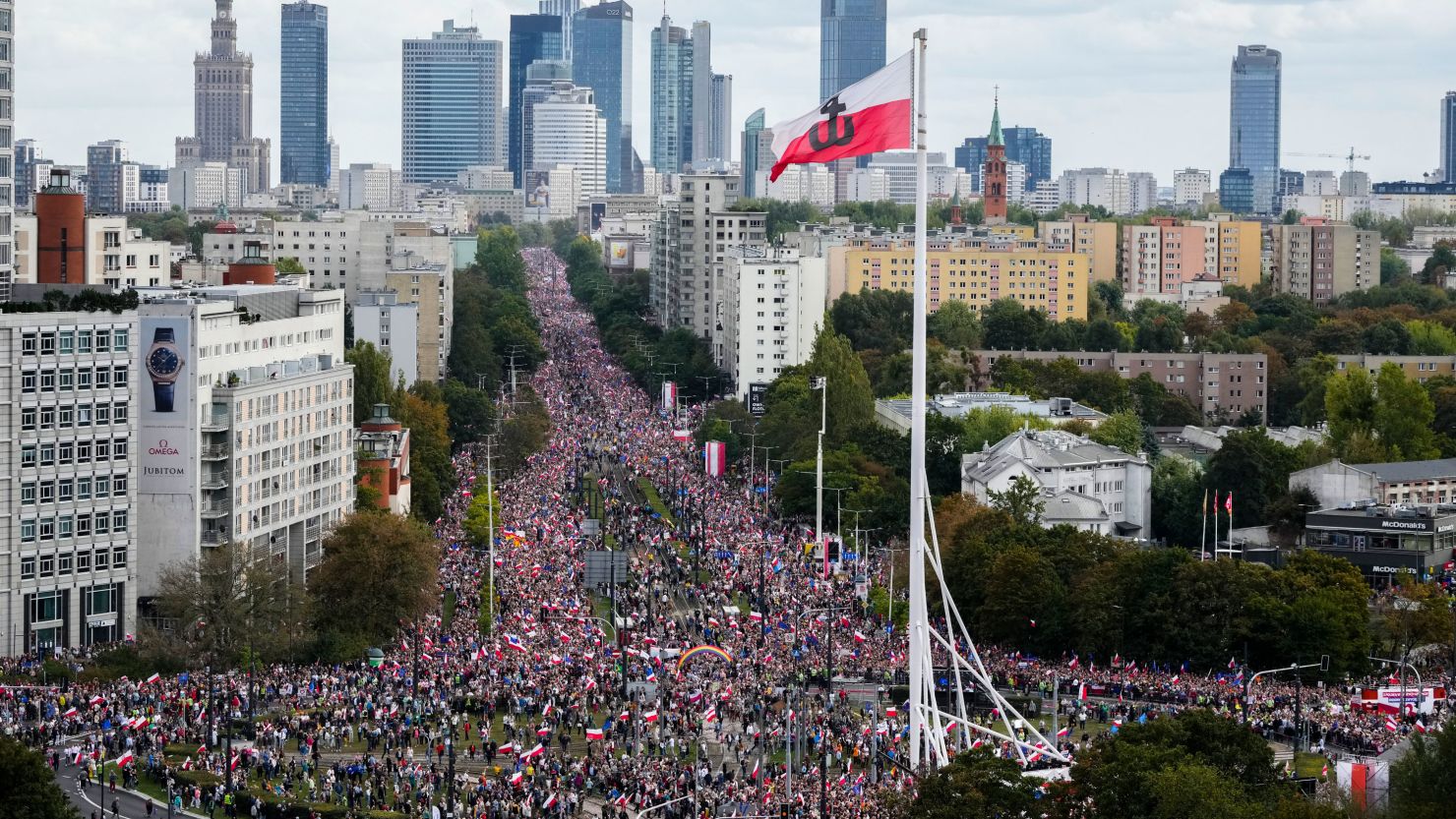 Thousands of people gather for a march in support of the opposition political party on Sunday.