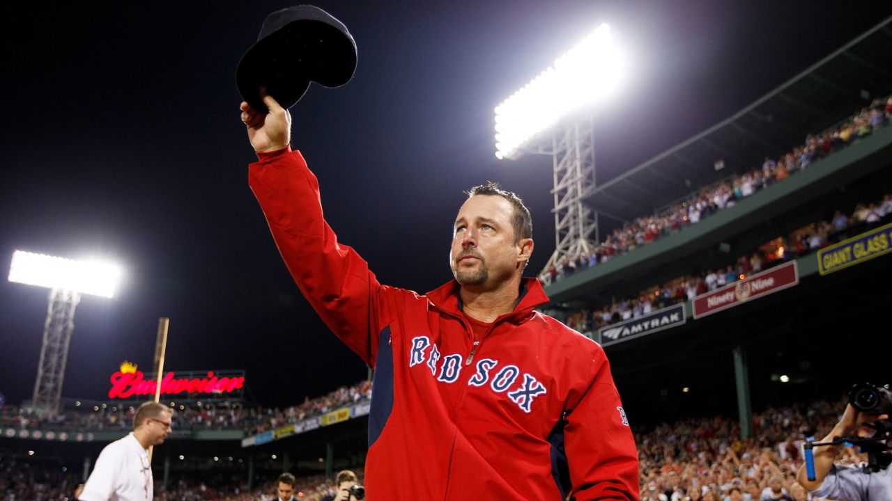 Red Sox pitcher Tim Wakefield waves to the crowd after winning his 200th (and final) career win in September 2011. 
