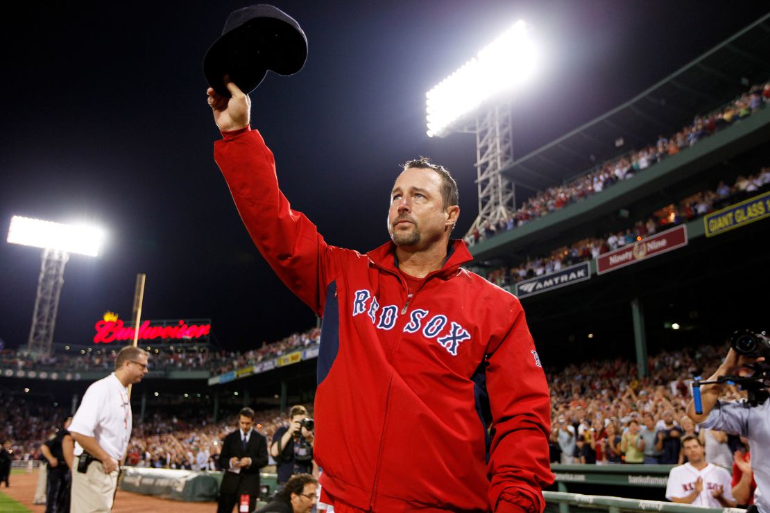Red Sox pitcher Tim Wakefield waves to the crowd after his 200th (and final) career win in September 2011.