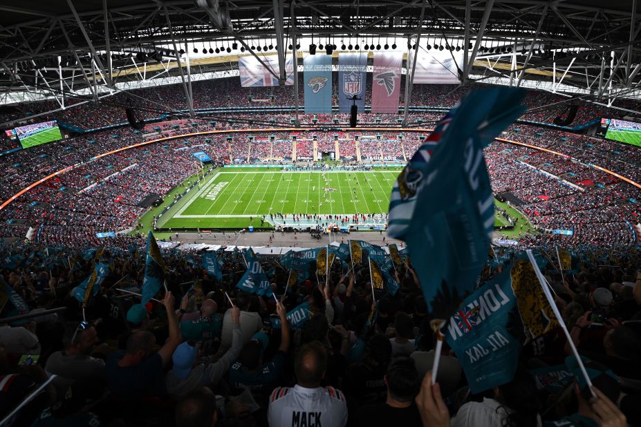 Jacksonville Jaguars fans wave flags ahead of a game against the Atlanta Falcons at Wembley Stadium in London. It was the first of five international games the NFL has scheduled this season as part of its ever-expanding International Series. The Jaguars won 23-7.
