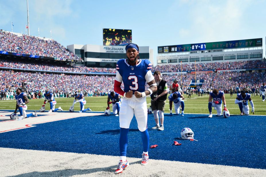 Buffalo Bills safety Damar Hamlin shouts while warming up ahead of the Bills game against the Miami Dolphins. Hamlin participated in the opening kickoff, his first regular season appearance after surviving a cardiac arrest on the field nearly nine months ago. The Bills beat the Dolphins 48-20.