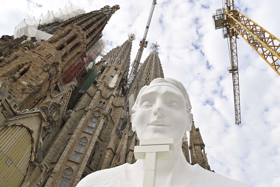 This picture taken on September 19, 2023 shows a pinnacle depicting a human figure that will be set at 135 meters high at the Evangelist Matthew's tower, during a press conference to announce the new steps in the construction of the Expiatory Church of the Sagrada Familia basilica in Barcelona. Jordi Fauli is the seventh architect director of Spanish architect Antoni Gaudi's master piece the Sagrada Familia (Holy Family) basilica, an infinite work that has been built for almost 140 years in the heart of Barcelona. (Photo by Pau BARRENA / AFP) (Photo by PAU BARRENA/AFP via Getty Images)