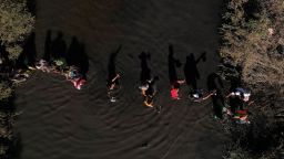 Migrants, who were stranded a day earlier near Villa Ahumada, and who are seeking asylum in the United States, cross the Rio Bravo river, as seen from Ciudad Juarez , Mexico September 30, 2023. REUTERS/Jose Luis Gonzalez
