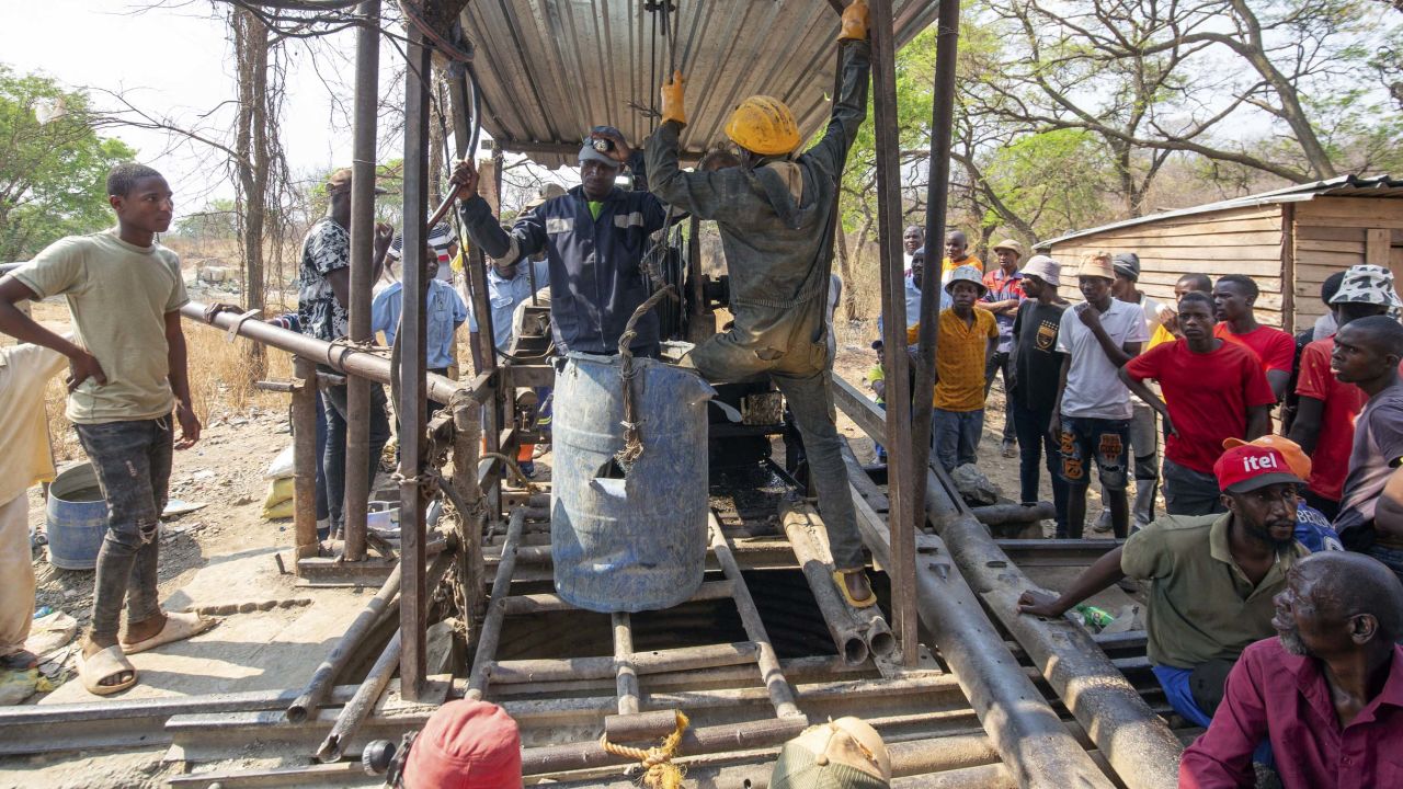 Artisanal miners are seen during a rescue mission at the collapsed mine shaft.