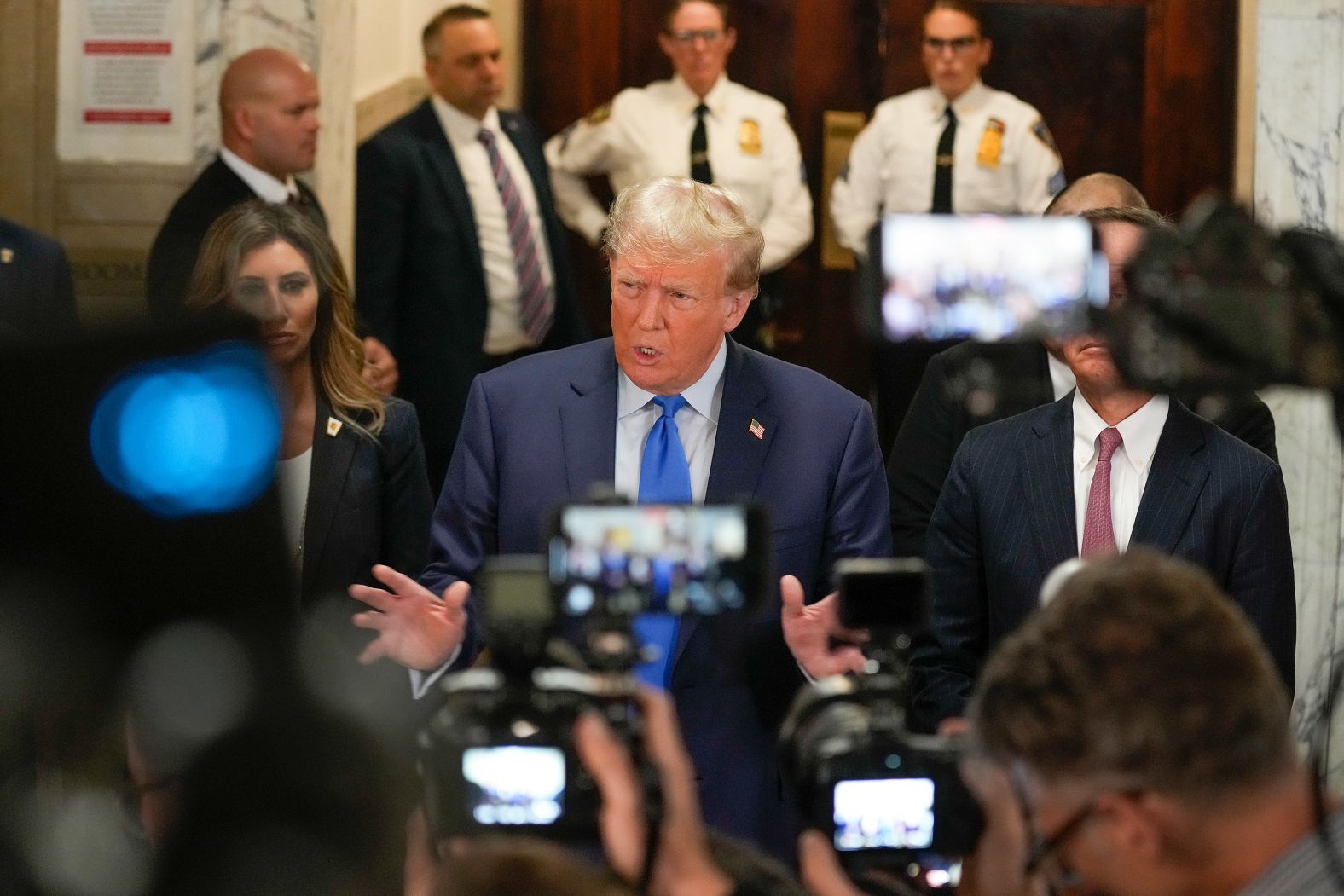 Trump speaks to the media at the New York Supreme Court on October 2. <a href="index.php?page=&url=https%3A%2F%2Fwww.cnn.com%2Fpolitics%2Flive-news%2Ftrump-fraud-trial-new-york-10-02-23%2Fh_e83e2797310240ba7e8540e4c80ba014" target="_blank">On his way to the courtroom</a>, Trump said the civil fraud trial is a "continuation of the single greatest witch hunt of all time." He also called it "a scam and a sham."
