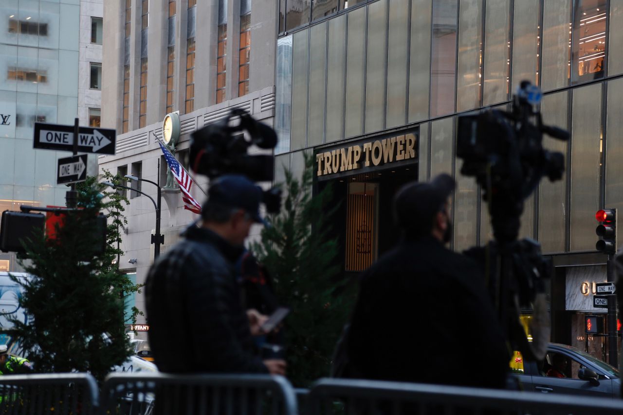 Members of the media set up outside New York's Trump Tower on Monday.