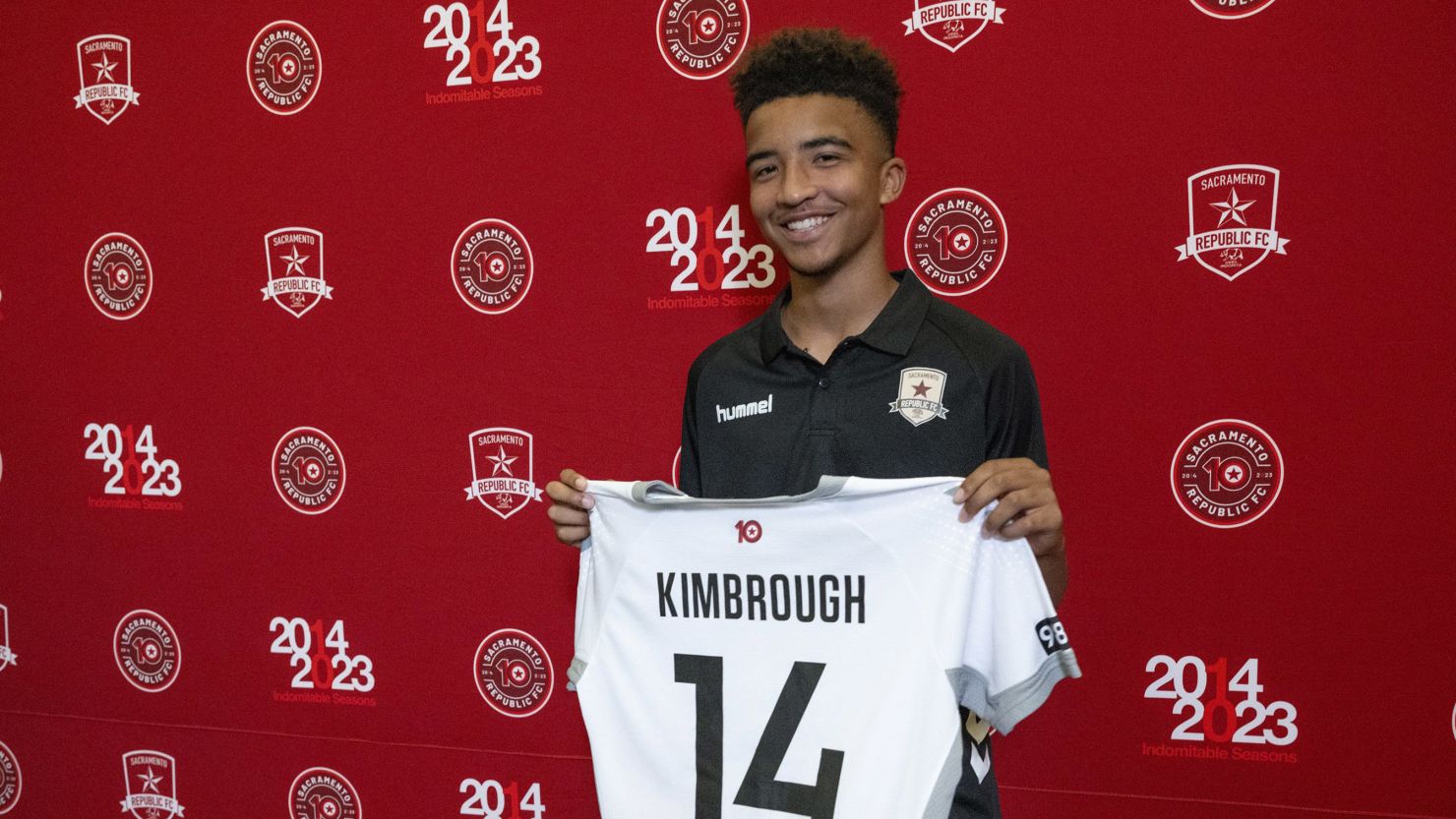Da'vian Kimbrough, 13, holds up his jersey after signing contract with the Sacramento Republic of the second-tier League Championship of the United Soccer League, Tuesday, Aug. 8, 2023,  in Sacramento, Calif. (Paul Kitagaki Jr./The Sacramento Bee via AP)