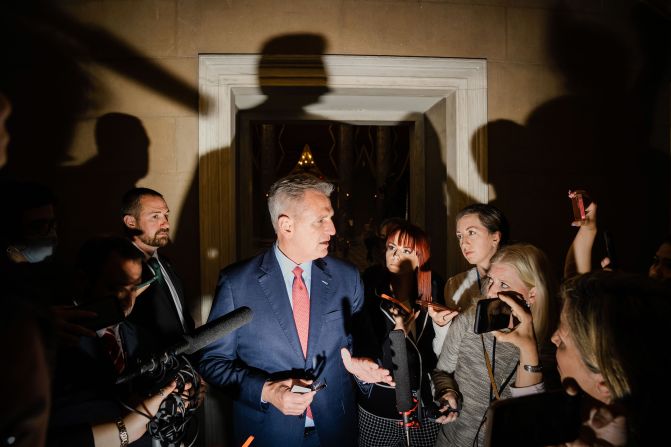 McCarthy speaks with reporters as he leaves the House Chamber in May 2023.