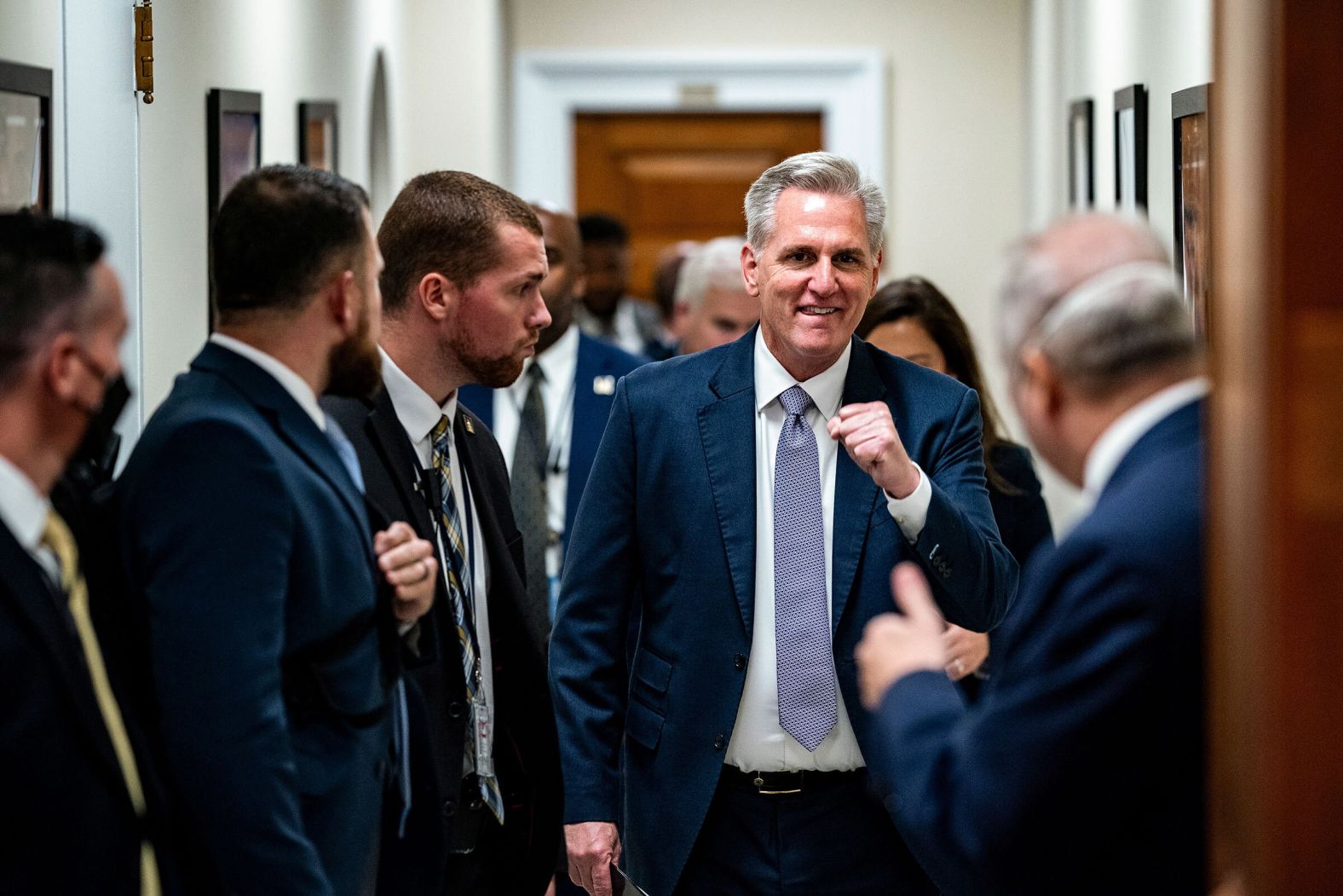 McCarthy celebrates in September 2023 after the House approved a stopgap bill to <a href="https://www.cnn.com/2023/09/30/politics/us-government-shutdown-latest/index.html" target="_blank">avert a government shutdown</a>.
