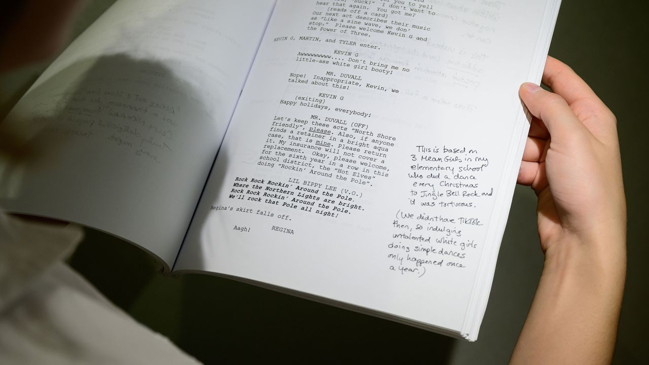 An annotated copy of "Mean Girls: The Musical" by Tina Fey is seen at Christies auction house in September.