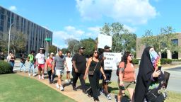 Protesters gather in Decatur, Alabama, gather on October 1 to demand answers in the police shooting of Stephen Perkins 