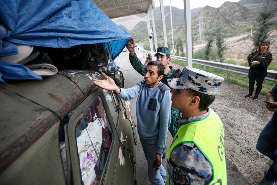 Nagorno-Karabakh refugees begin arriving in Armenia after Azerbaijan's  military offensive